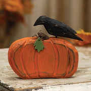 Carved Wooden Crow on Pumpkin