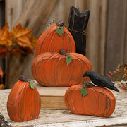 Carved Wooden Crow on Pumpkin