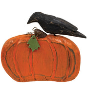 Carved Wooden Crow on Pumpkin