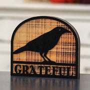 Grateful Crow Silhouette Plaid Background Wooden Sitter