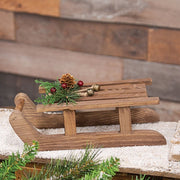 Wood Sled with Pine and Berries