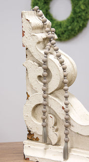 Distressed Wooden Bead Garland With Tassels