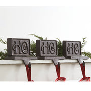 Set of Three Cast Iron Ho Ho Ho Stocking Holders