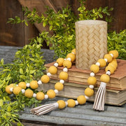 Distressed Yellow and White Bead Garland with Tassels