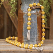 Distressed Yellow and White Bead Garland with Tassels