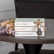 In a Field of Roses Be a Wildflower Wooden Book Stack