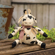 Donovan Cow with Bell Doll